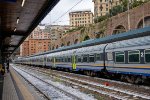 A train of MDVC and MDVE cars wait to depart Genova Piazza Principe